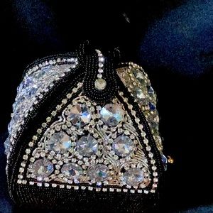 White,gold, silver, and black with diamonds all four sides